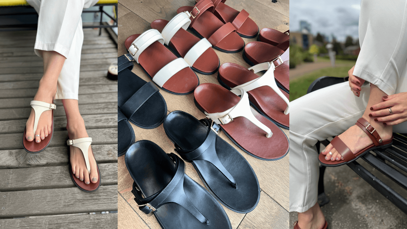 White and black sandals on wooden surface